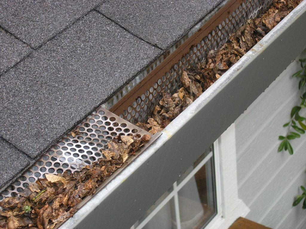 Gutter guards filled with leaves 