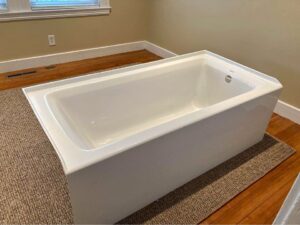Fiberglass bathtub with a hairline crack in it.