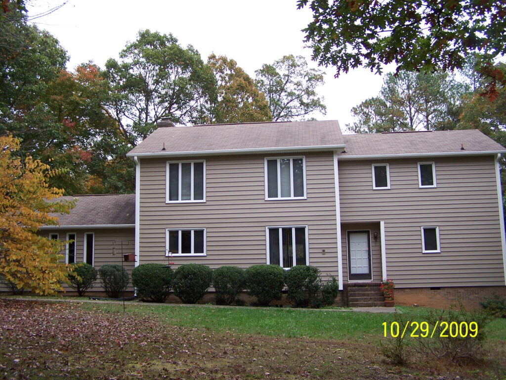 The front view of the house with engineered wood siding